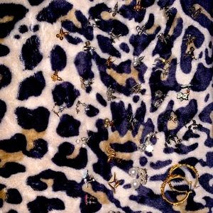 39 pairs of sliver earrings